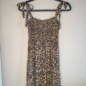 Cheetah Sundress Small. Very flattering. Goes down to my ankles (im 5’3”)